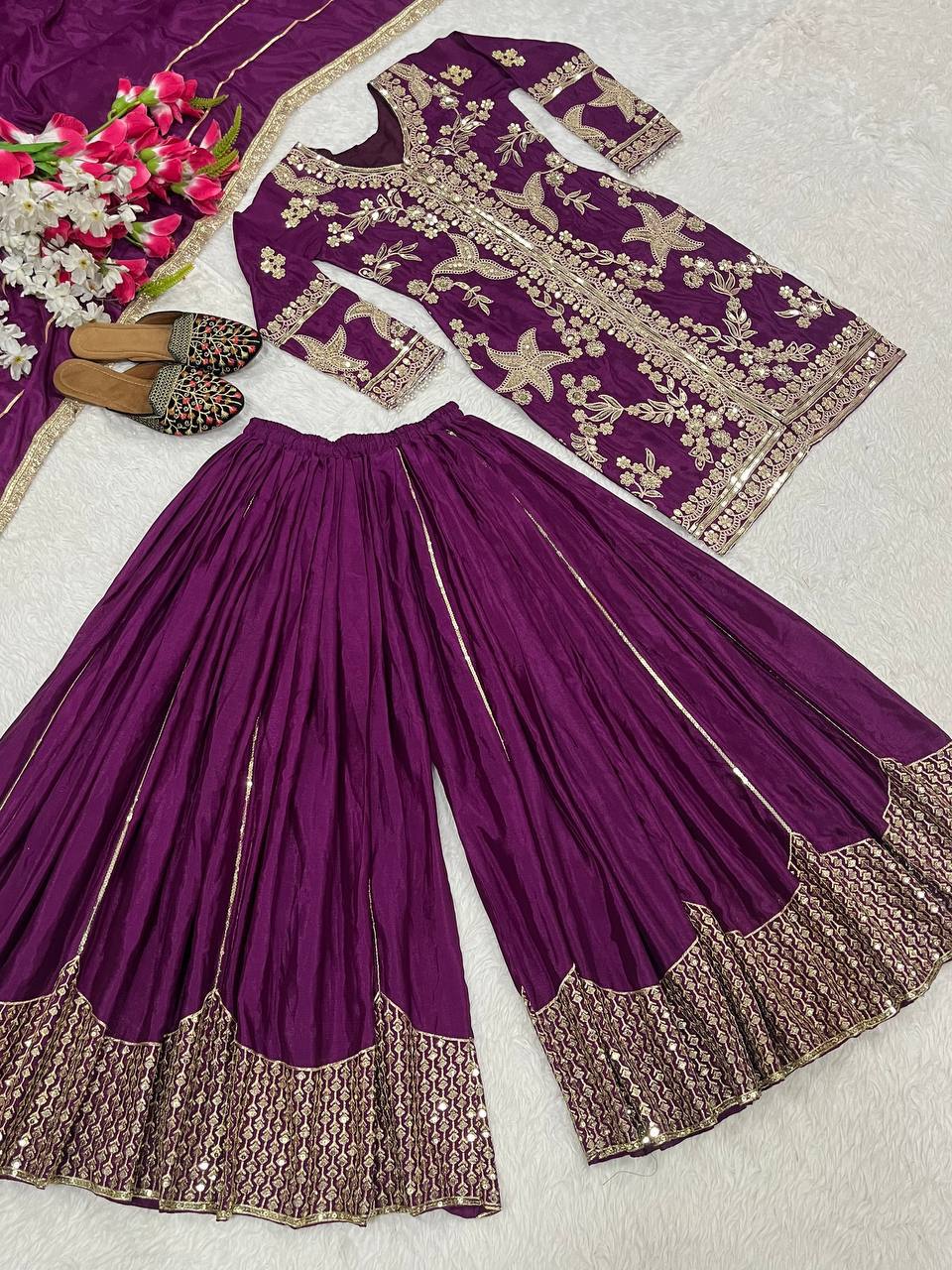 Regal Wine Purple Kurti and Flared Palazzo Suit Set Embellished with Intricate Floral Zari and Mirror Work